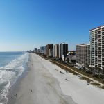 high-rise buildings near seashore